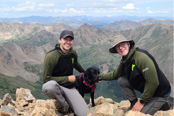 A PCI patient climbs a mountain after knee replacement surgery.